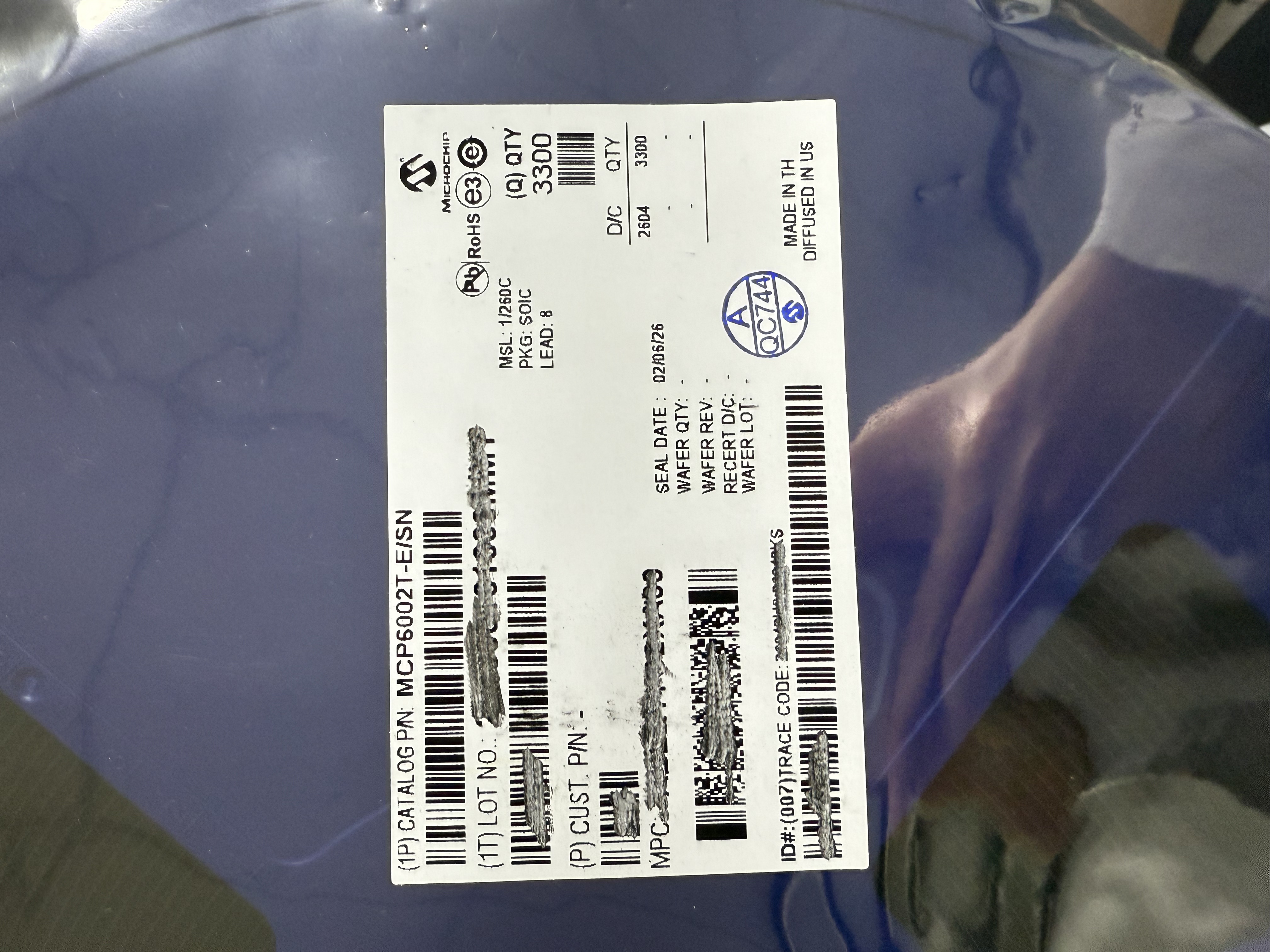 MCP6002T-E/SN